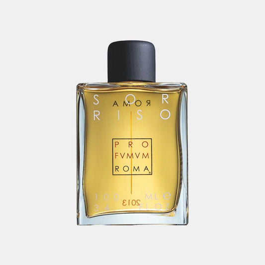 A sample bottle of Profumum Roma Sorriso perfume, featuring a simple rectangular design with an elegant black cap and a clear glass body showcasing the amber liquid inside.