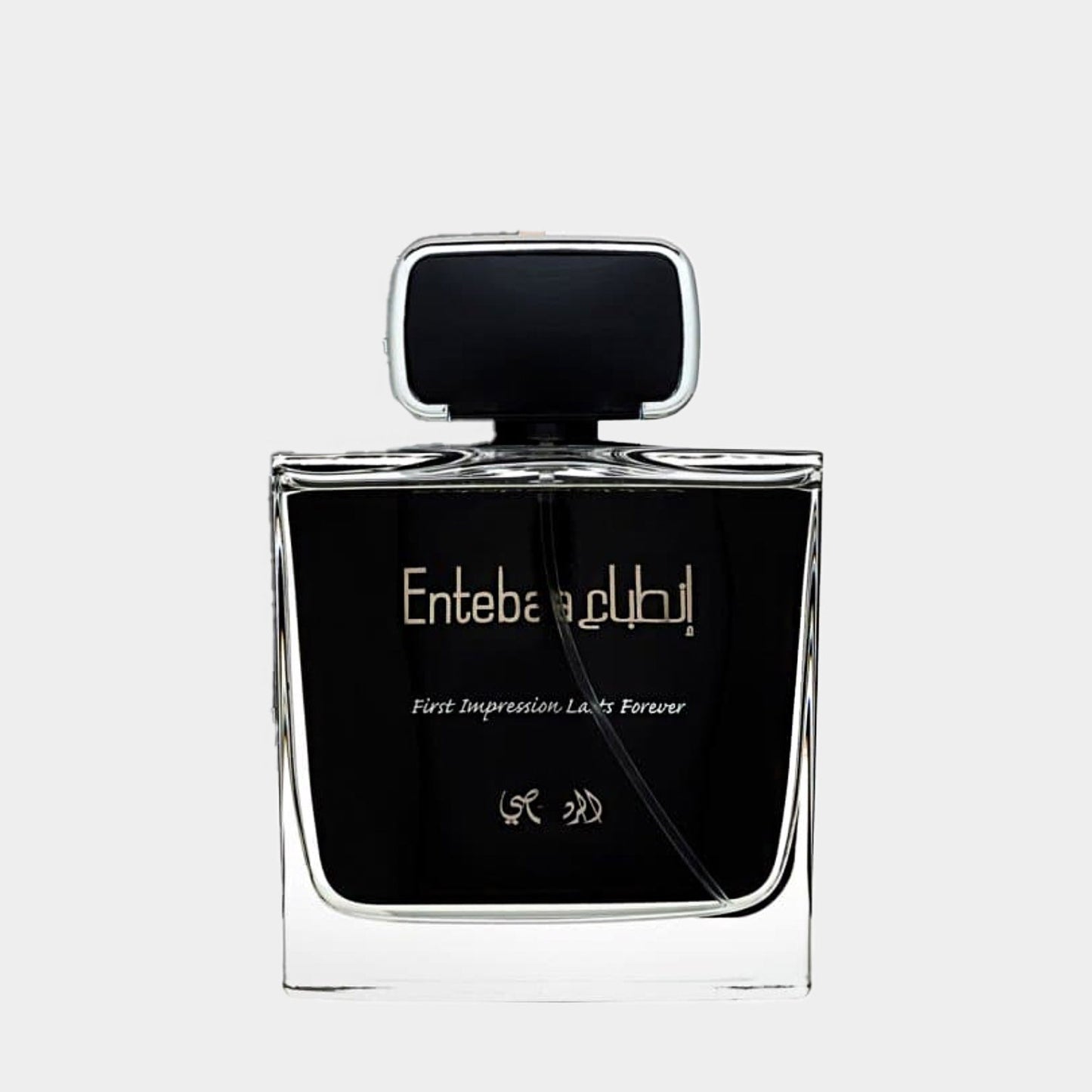 Rasasi Entebaa Men Sample fragrance in a sleek transparent bottle with a black cap, featuring elegant detailing and the label 'First Impression, Lasts Forever.'