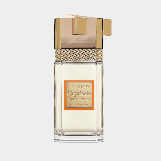 A sleek glass bottle of Somens Capriccio Sample, featuring an elegant gold cap and a decorative textured band, with a label indicating it is an Eau de Parfum.