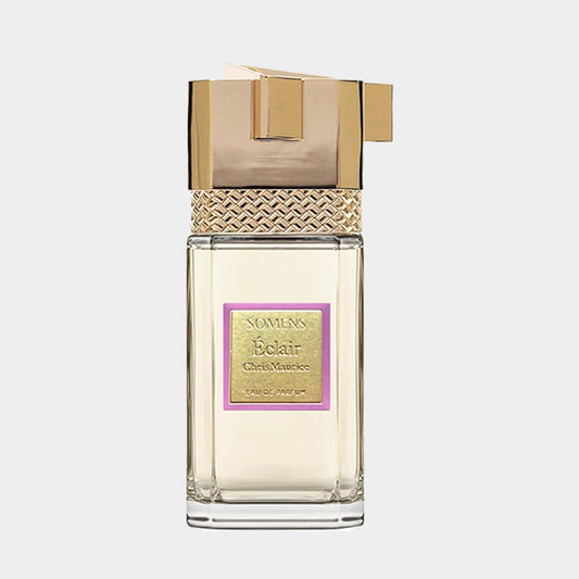 Somens Eclair Sample perfume bottle featuring a stylish design with a gold top and decorative accents, showcasing an elegant fragrance in a clear glass container.