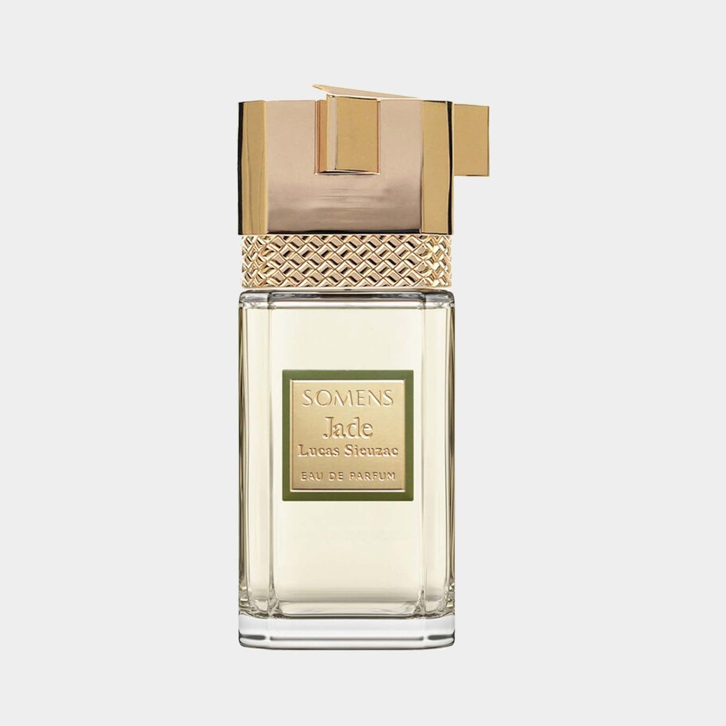 A luxurious bottle of Somens Jade Sample Eau de Parfum, featuring an elegant design with a textured gold cap and a clear rectangular body.