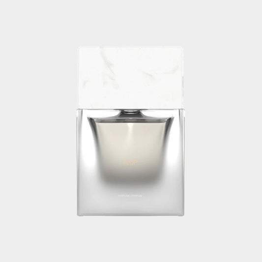 A sleek, modern perfume bottle with a marble-topped lid, labeled 'Sora Dora Ylop Full Bottle'. The bottle features a minimalist design, highlighting its elegant and sophisticated aesthetic.