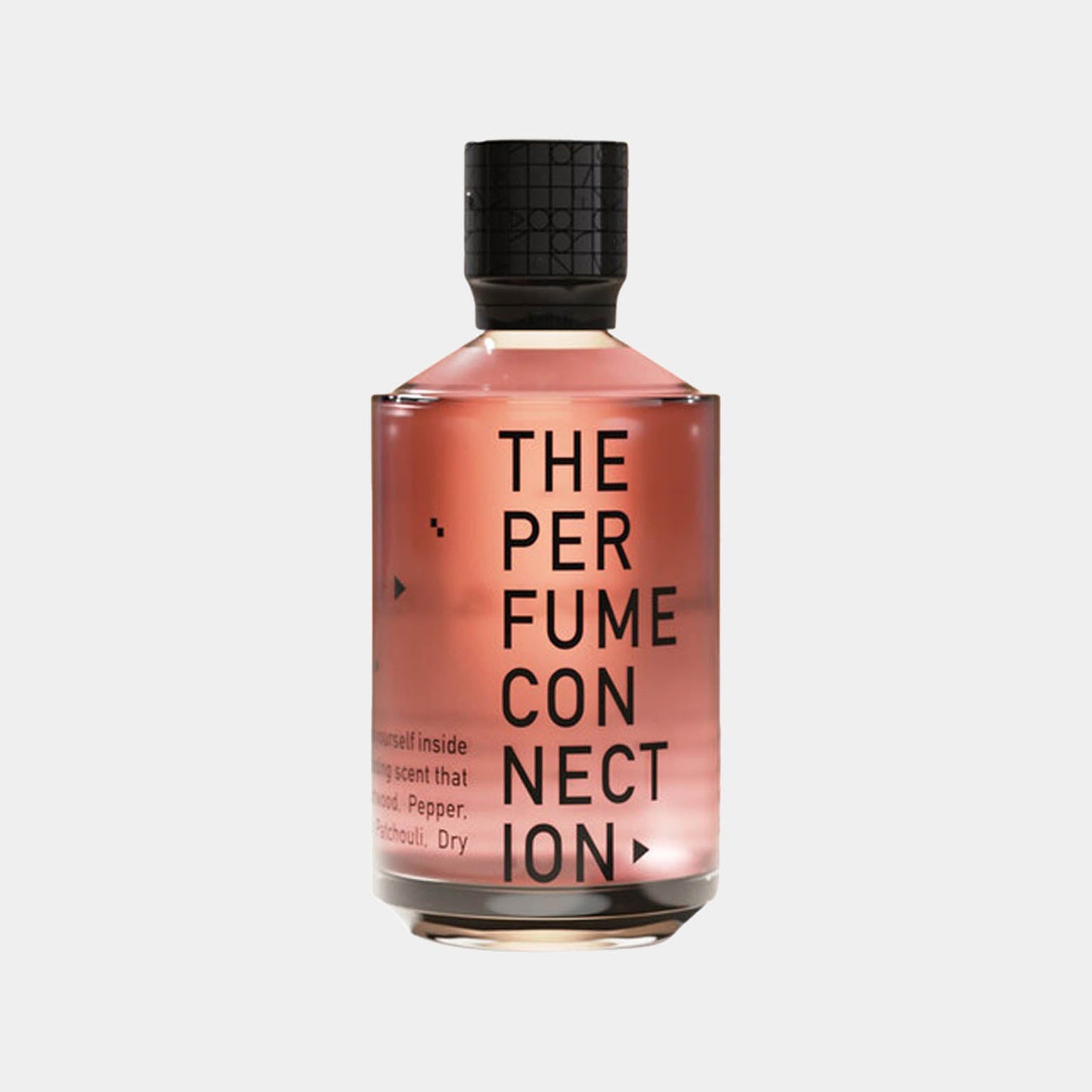The Perfume Connection (TPC) Lip-Lock Sample, featuring a sleek bottle with a modern design, showcasing a pink liquid inside that combines notes of wood, pepper, and patchouli for a captivating fragrance experience.