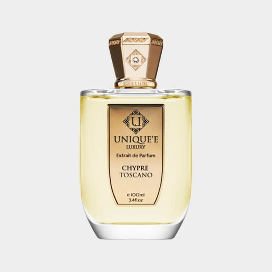 A full bottle of Unique'e Luxury Chypre Toscano Extrait de Parfum, showcasing an elegant design with a golden cap and a clear glass body, containing 100 ml of the luxurious fragrance.