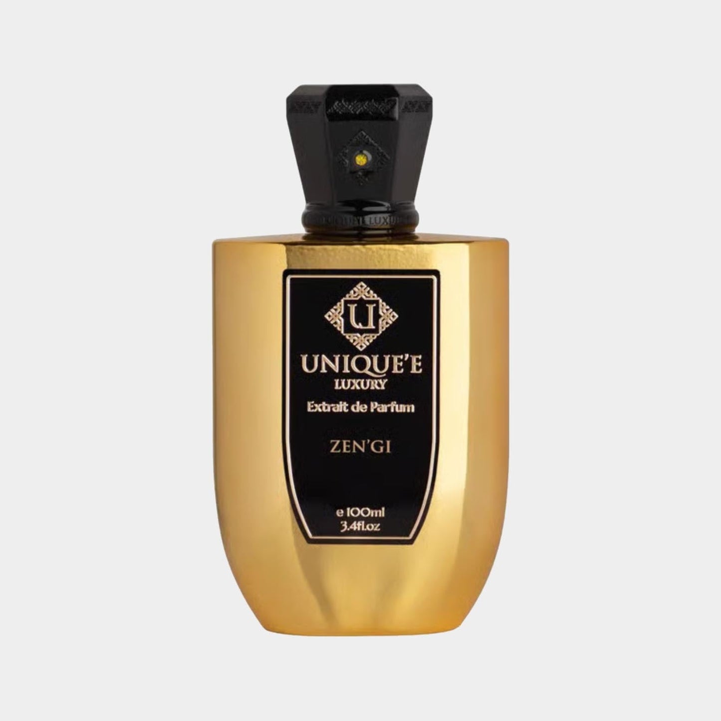 A luxurious gold bottle of 'Unique'e Luxury Zen'gi Sample' perfume, featuring an ornate black label and an elegant cap, showcasing its premium design and fragrance richness.