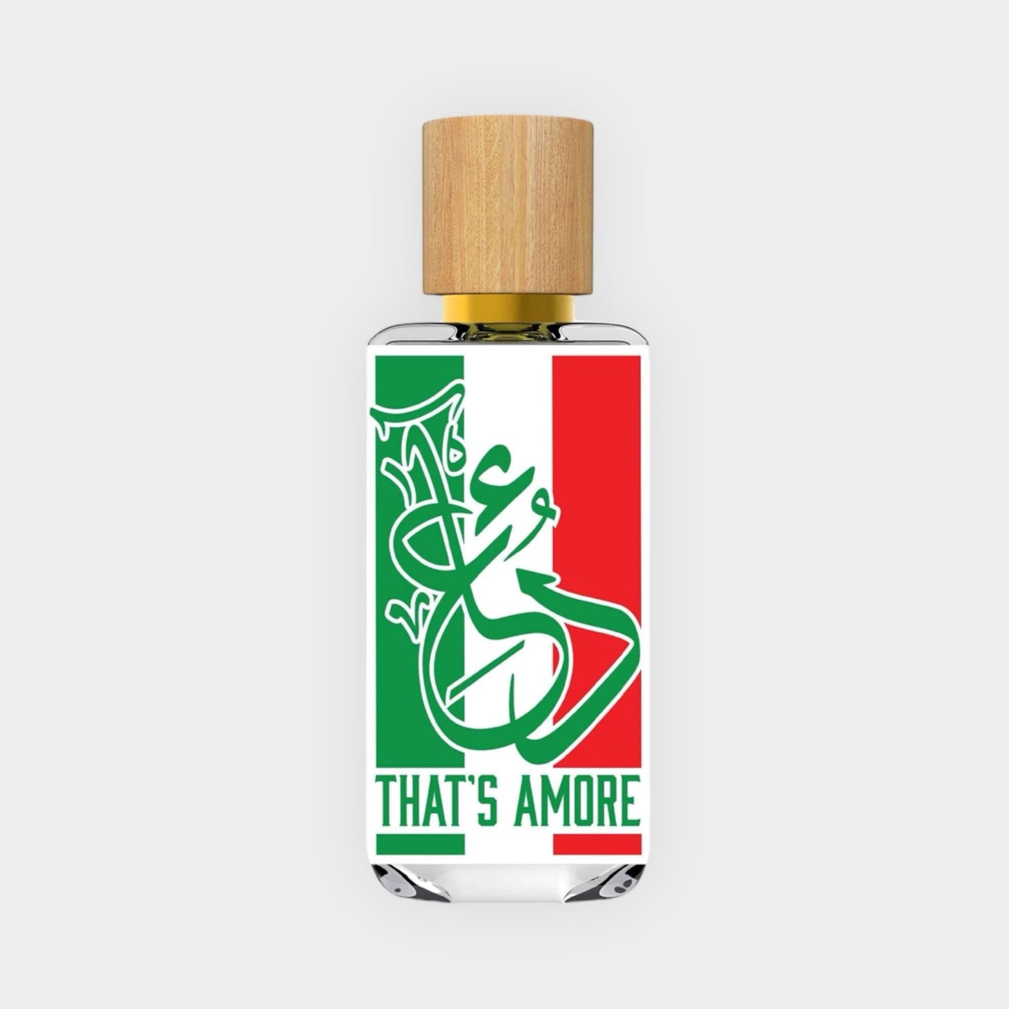 A clear bottle of Dua That's Amore Sample fragrance featuring a wooden cap and adorned with a green and red design, embodying an Italian theme. The label prominently displays the text THAT'S AMORE.