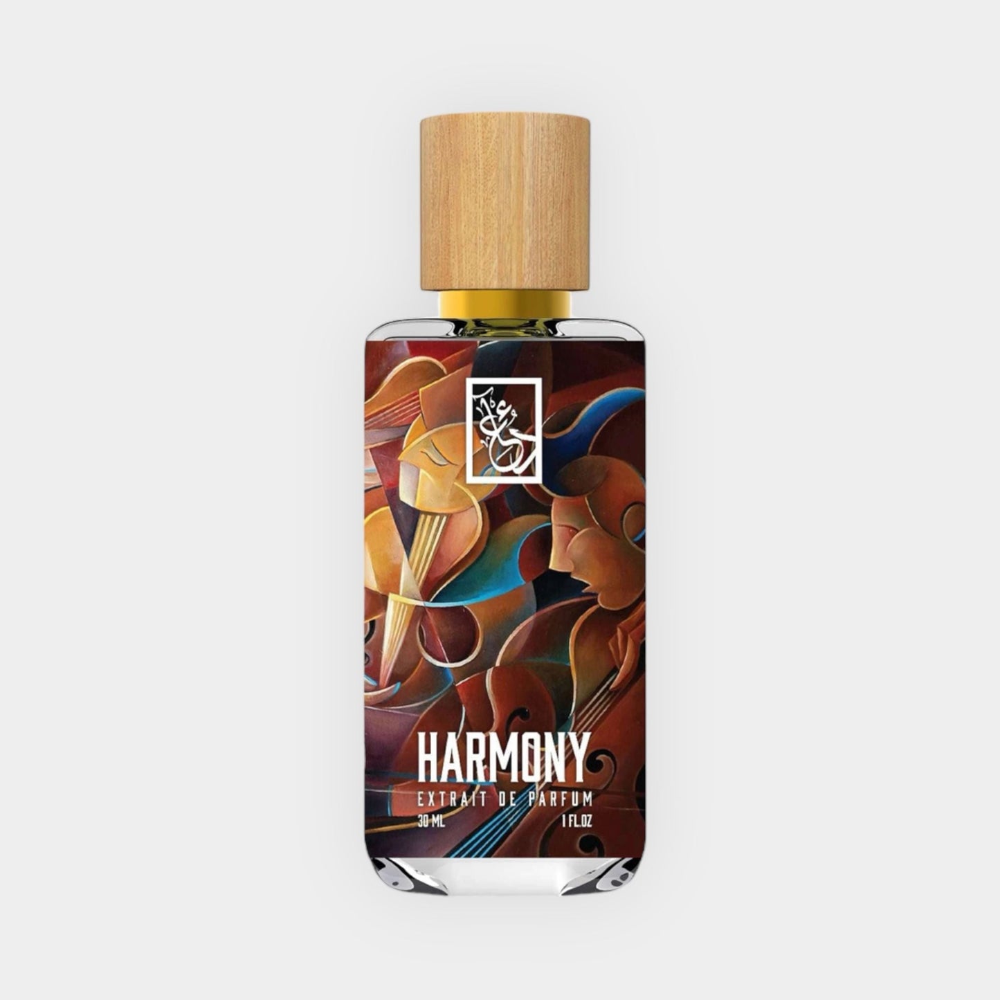 A bottle of Dua Harmony Sample fragrance, featuring a colorful artistic label and a wooden cap, resting on a light background. The bottle design combines elegance with vibrant artwork.