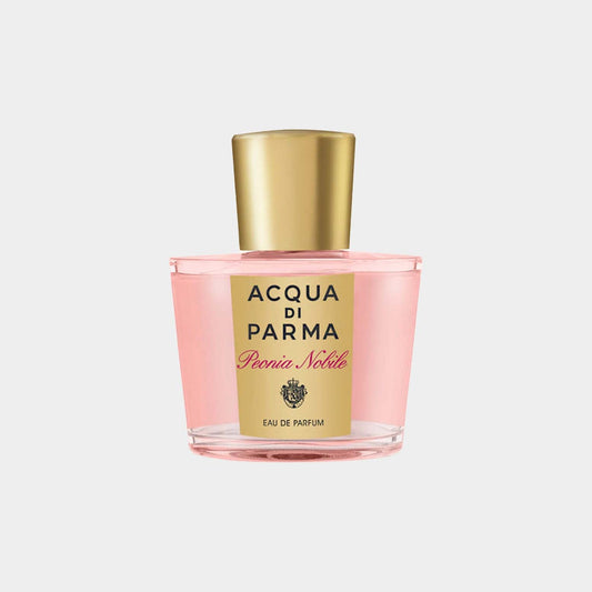 Acqua Di Parma Peonia Nobile Sample in a pink glass bottle with a gold lid, featuring a stylish label that showcases the fragrance's name. This sample showcases the elegant floral scent inspired by peonies.