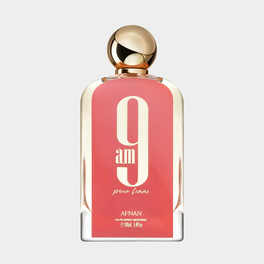 Afnan Perfumes 9AM Pour Femme Sample features a chic bottle with a pink-tinted glass and a stylish gold cap, showcasing a blend of elegance and modernity. This sample size is perfect for on-the-go scent lovers.