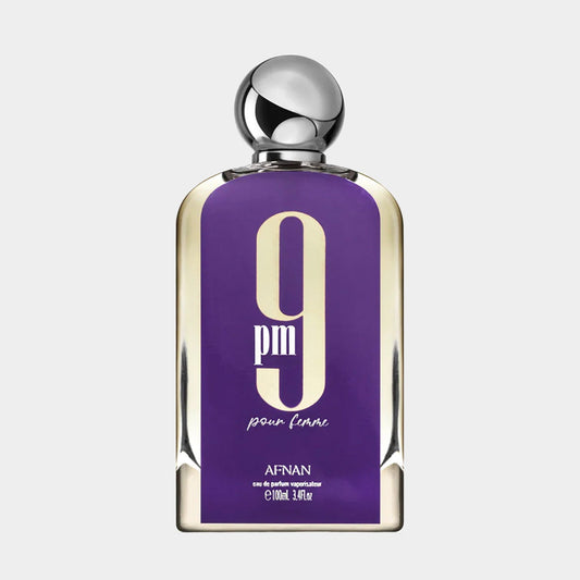 Afnan Perfumes 9PM Pour Femme Sample, featuring a sleek glass bottle with a purple label displaying '9 PM' and a metallic cap, designed for women's fragrance.