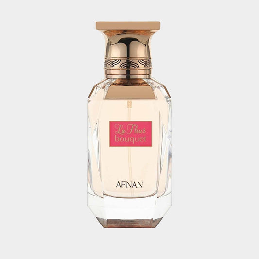Afnan Perfumes La Fleur Bouquet Sample features an elegantly designed bottle with a golden cap, showcasing a light floral fragrance. The pink label prominently displays the name La Fleur Bouquet.