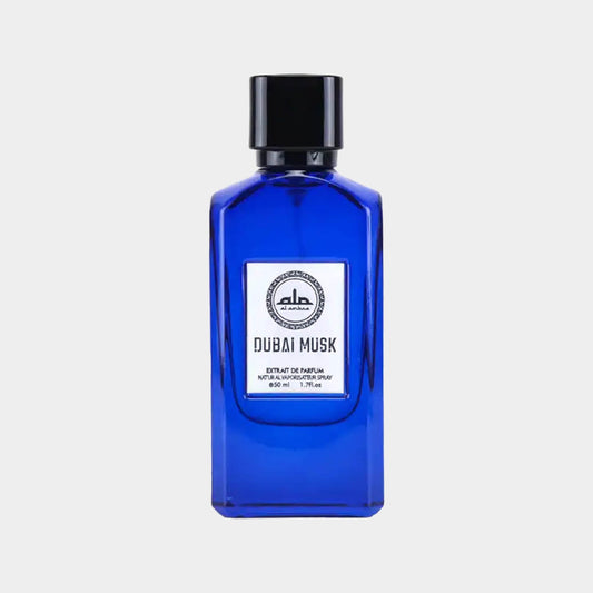 A full bottle of Al Ambra Dubai Musk, featuring a striking blue glass design with a black cap and a simple label showcasing the scent name.