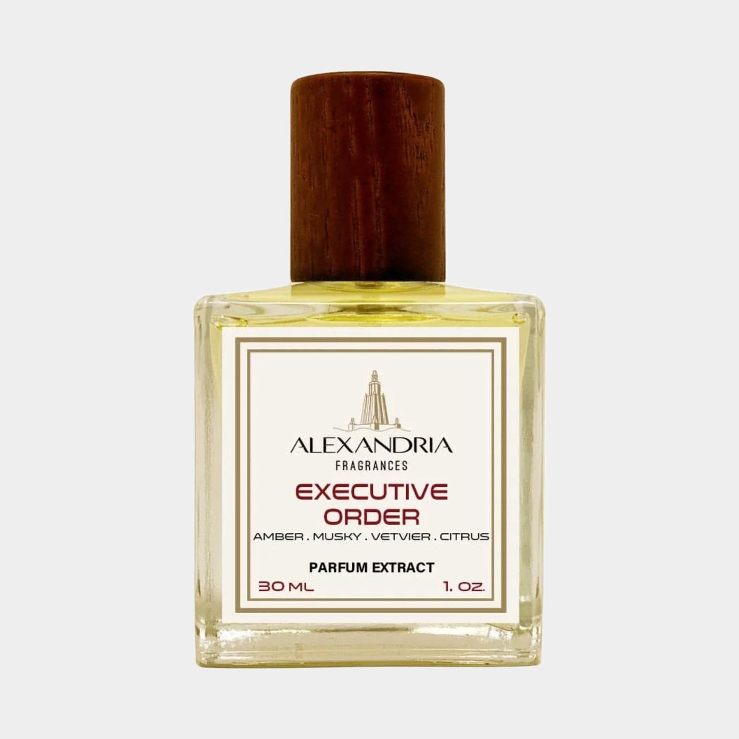 A 30 ml bottle of Alexandria Fragrances Executive Order Sample featuring a wooden cap, showcasing a light yellow liquid inside. The label highlights notes of amber, musky, vetiver, and citrus.