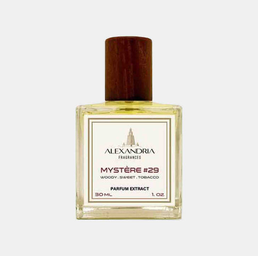 A 30ml bottle of Alexandria Fragrances Mystere #29, featuring a wooden cap and a label that describes the scent as woody, sweet, and tobacco.