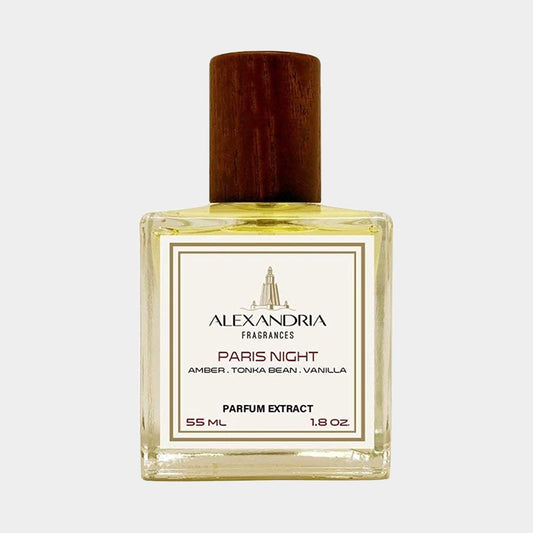 A bottle of Alexandria Fragrances Paris Night Sample, featuring a wooden cap and a label highlighting notes of amber, tonka bean, and vanilla. The 55 ml parfum extract exudes an air of sophistication and warmth.