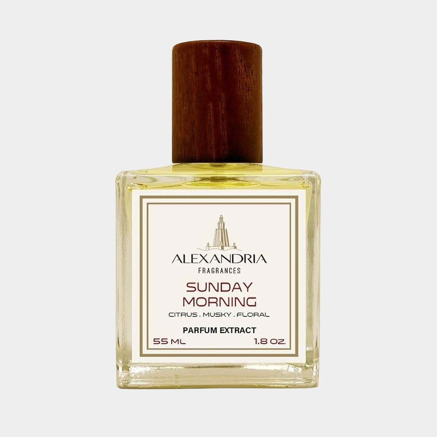 A full bottle of Alexandria Fragrances Sunday Morning, featuring a square glass design with a wooden cap, labeled as a musky and floral parfum extract in a 55 ml size.