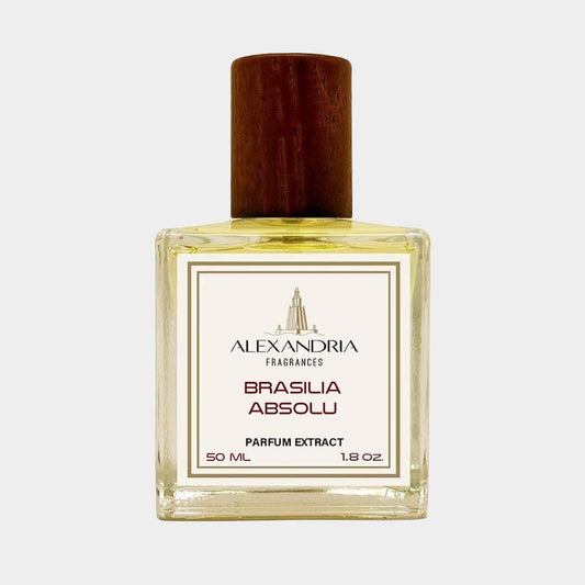 A clear glass bottle of Alexandria Fragrances Brasilia Absolu Sample, featuring a wooden cap, containing 50 ml of parfum extract with a warm yellow liquid inside.