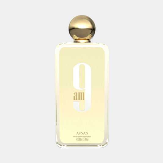 Afnan Perfumes 9AM Sample is a sleek and elegant fragrance bottle featuring a gold cap and a minimalist design, showcasing the product's signature branding in a modern font. The sample size is 10 ml, perfect for on-the-go use.