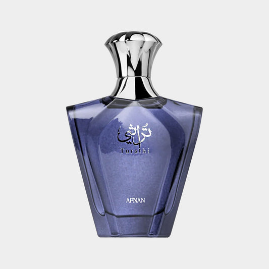 Afnan Perfumes Turathi Blue full bottle featuring a sleek, elegant design in a deep blue glass with a silver cap and intricate branding.