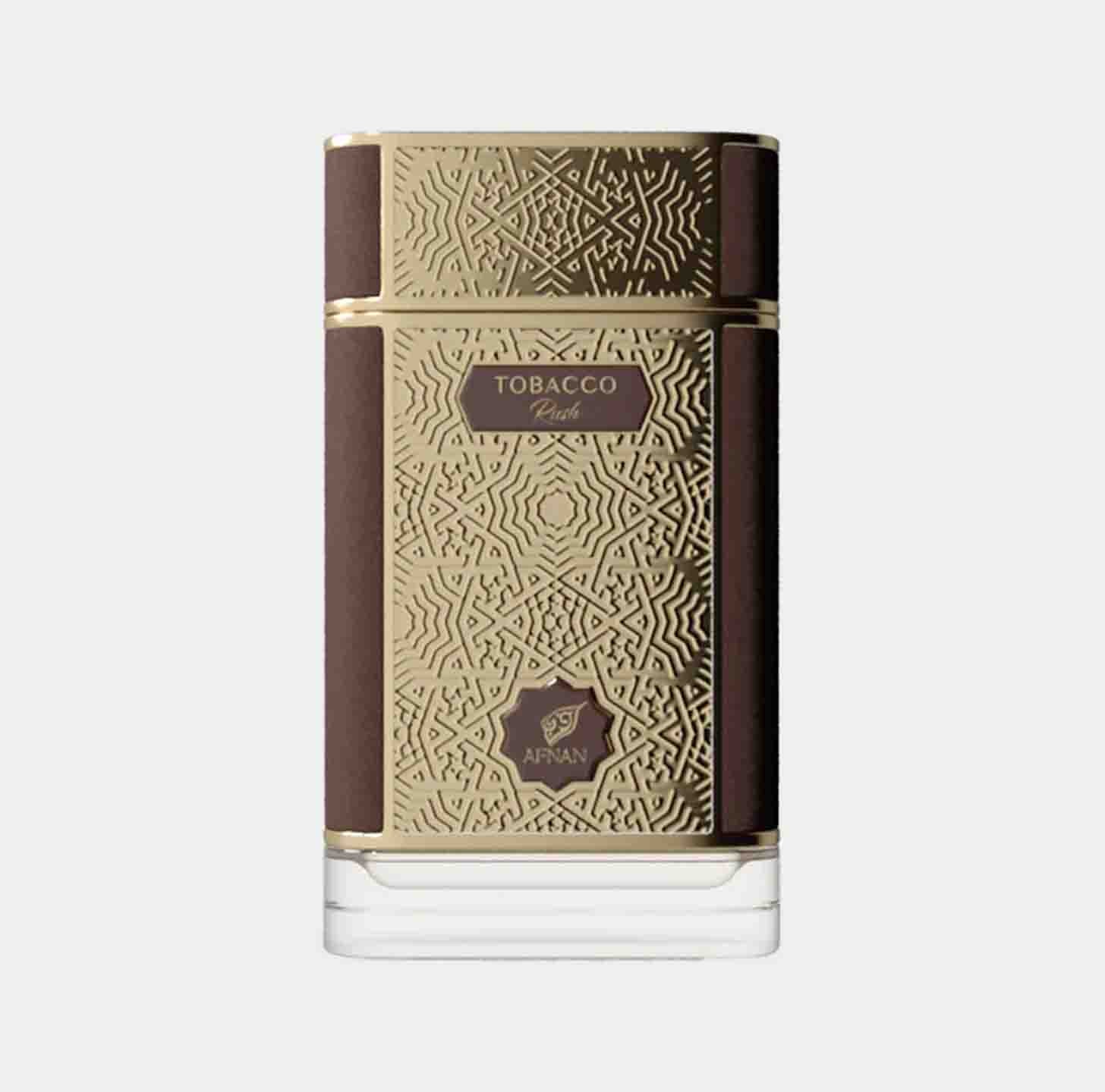 Afnan Perfumes Tobacco Rush Sample showcasing an elegantly designed bottle featuring intricate gold patterns and a deep brown accent. The label prominently displays the name Tobacco Rush.