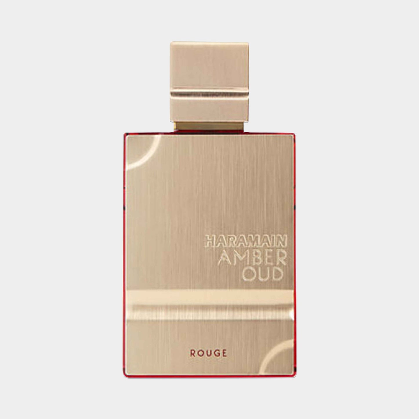 Al Haramain Amber Oud Rouge Sample is a luxurious fragrance featuring a sleek gold bottle with a striking red accent, showcasing its elegant design. The sample is perfect for experiencing the rich, aromatic scent profile of this signature perfume.