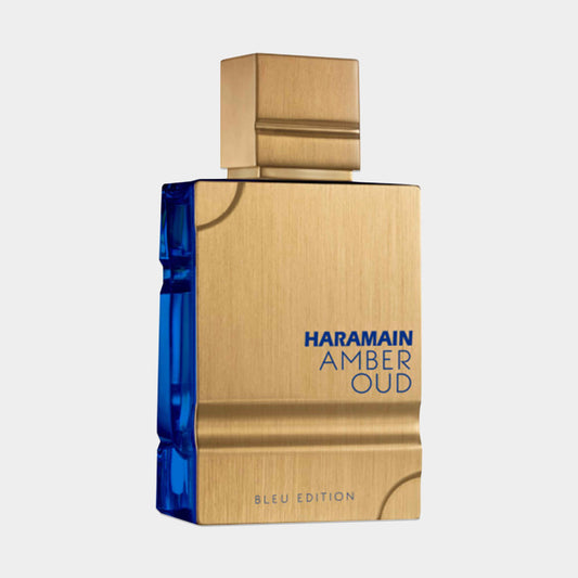 Sample bottle of Al Haramain Amber Oud Blue Edition, featuring a striking blue and gold design, with bold lettering showcasing the brand and fragrance name.
