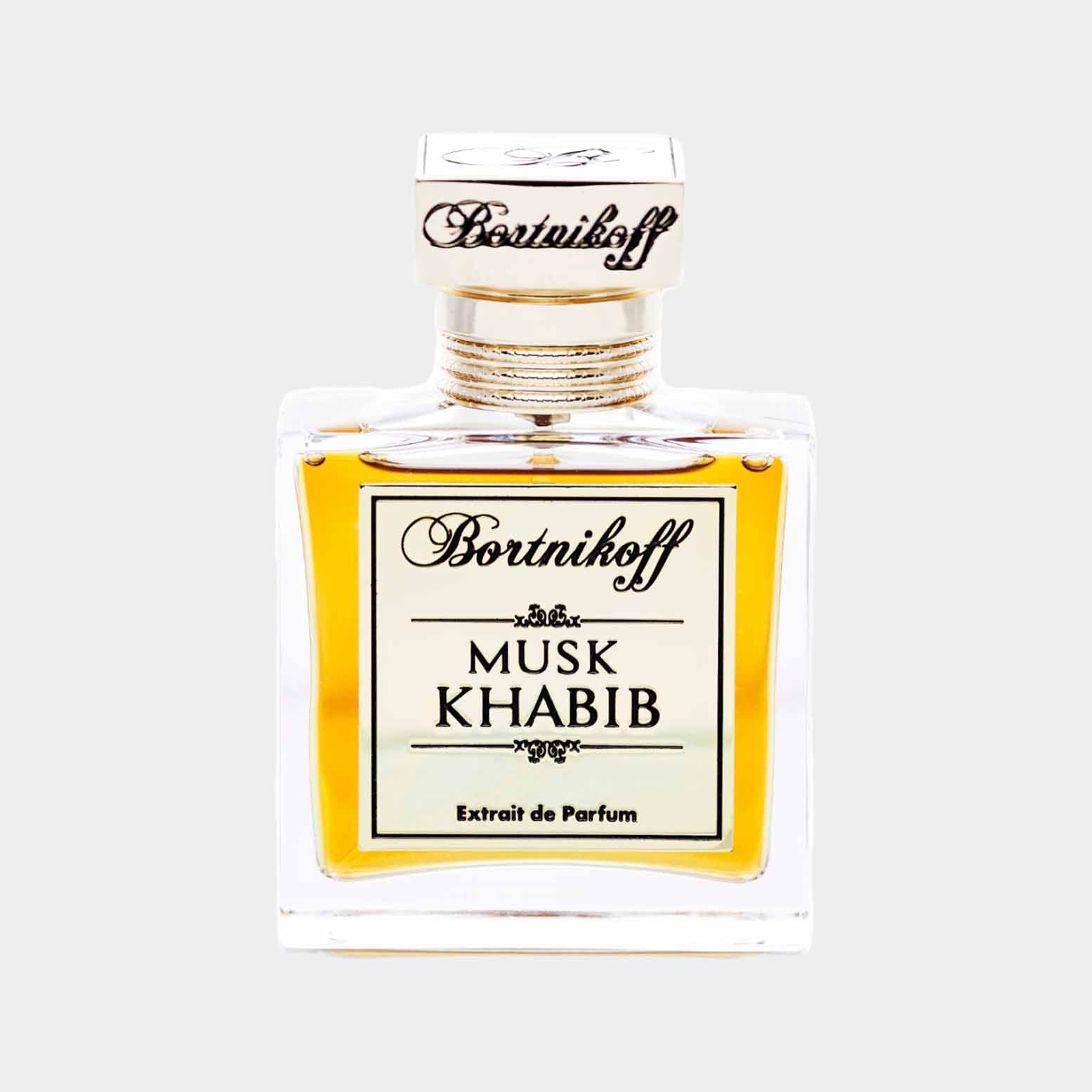 A full bottle of Bortnikoff Musk Khabib perfume, featuring an elegant rectangular glass design with a gold-accented cap and a label that reads Musk Khabib Extrait de Parfum.