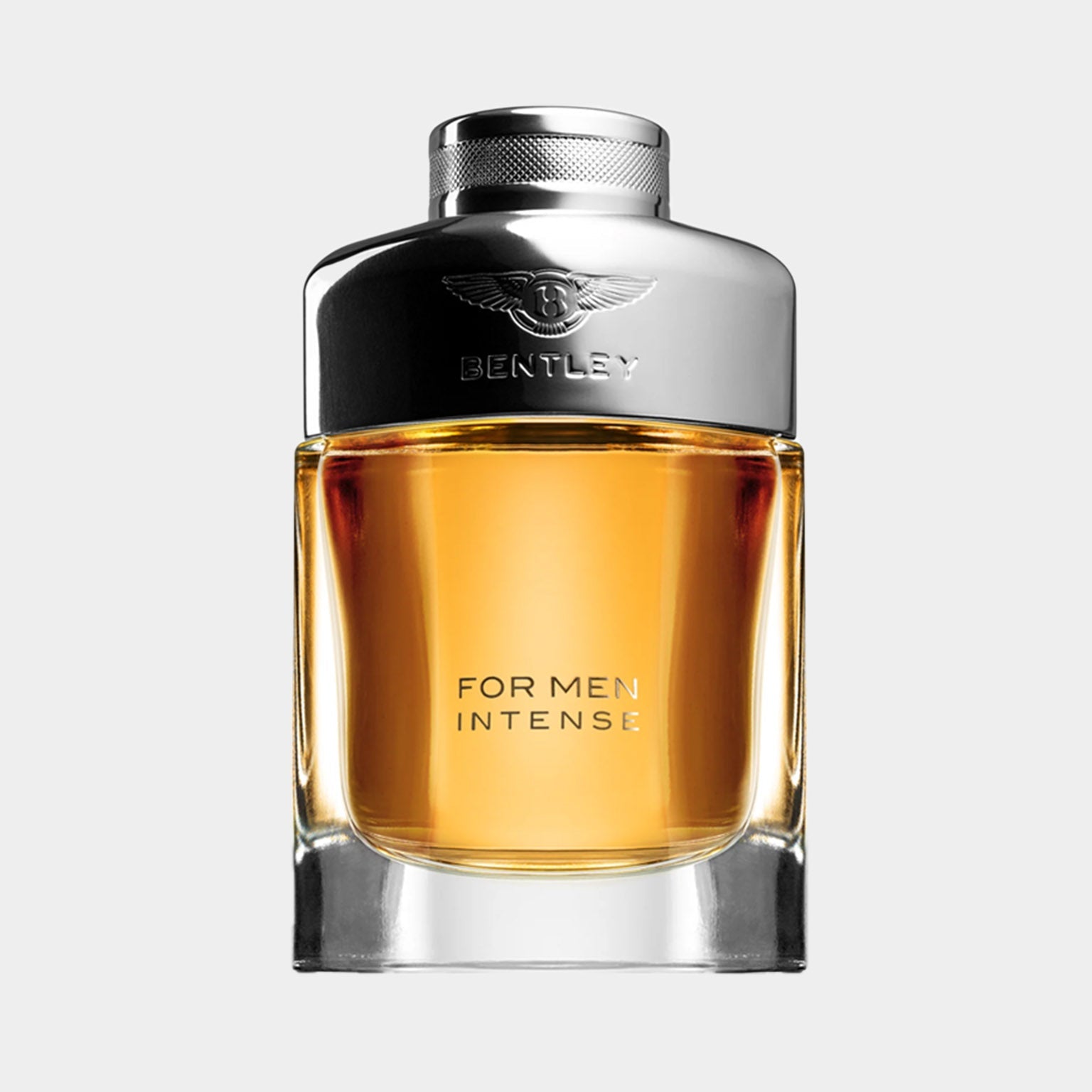 A sleek bottle of Bentley for Men Intense Sample fragrance, showcasing a rich amber liquid contained within a clear glass container, topped with a polished silver cap.