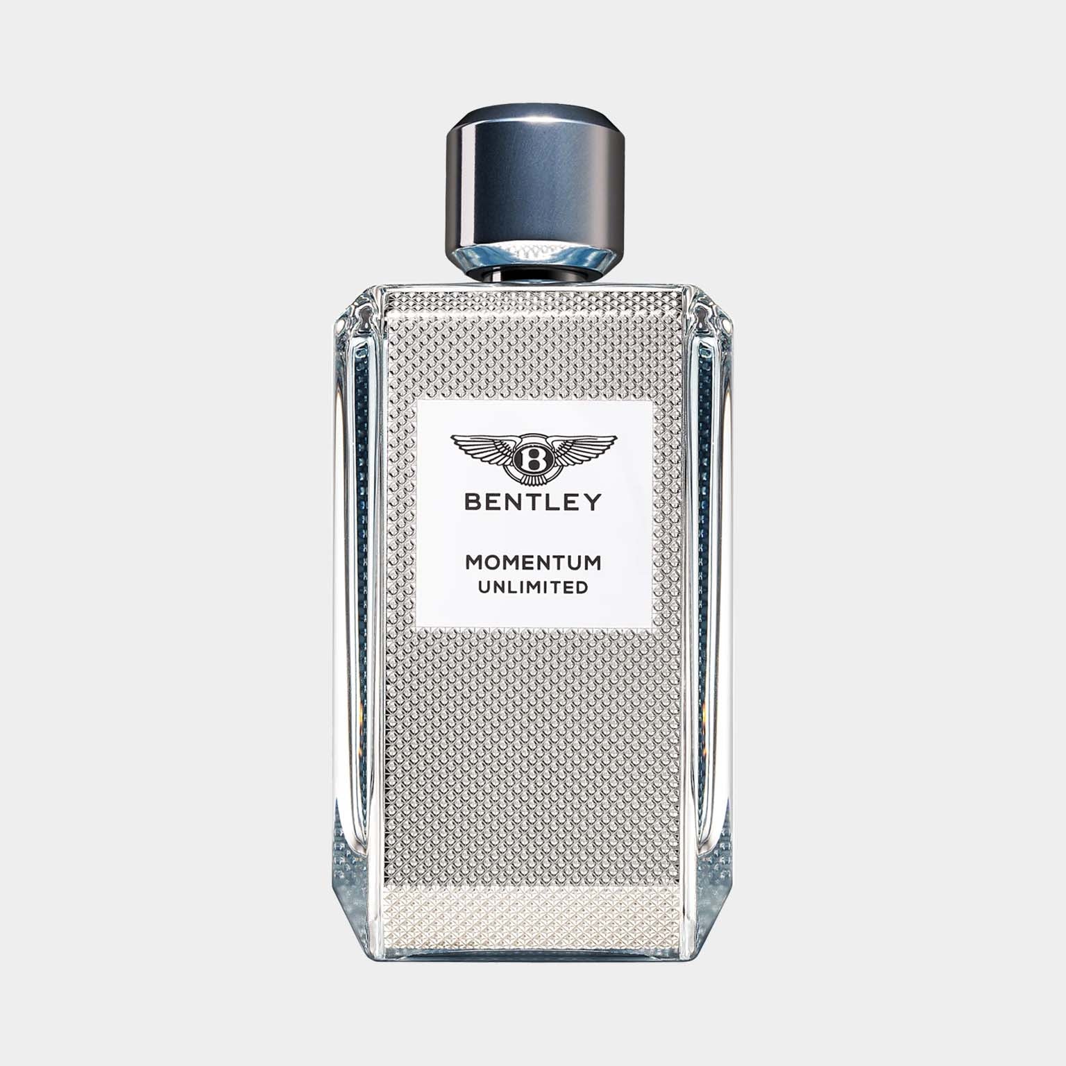 A sleek, silver glass bottle of Bentley Momentum Unlimited sample perfume, featuring a textured design and a silver cap, presented against a light background.