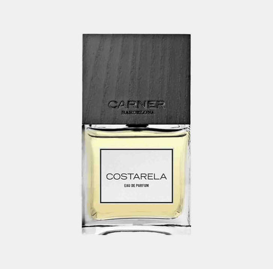 A stylish sample bottle of Carner Barcelona Costarela, featuring a sleek design with a black wooden cap and a clear glass base, showcasing the light yellow eau de parfum inside.
