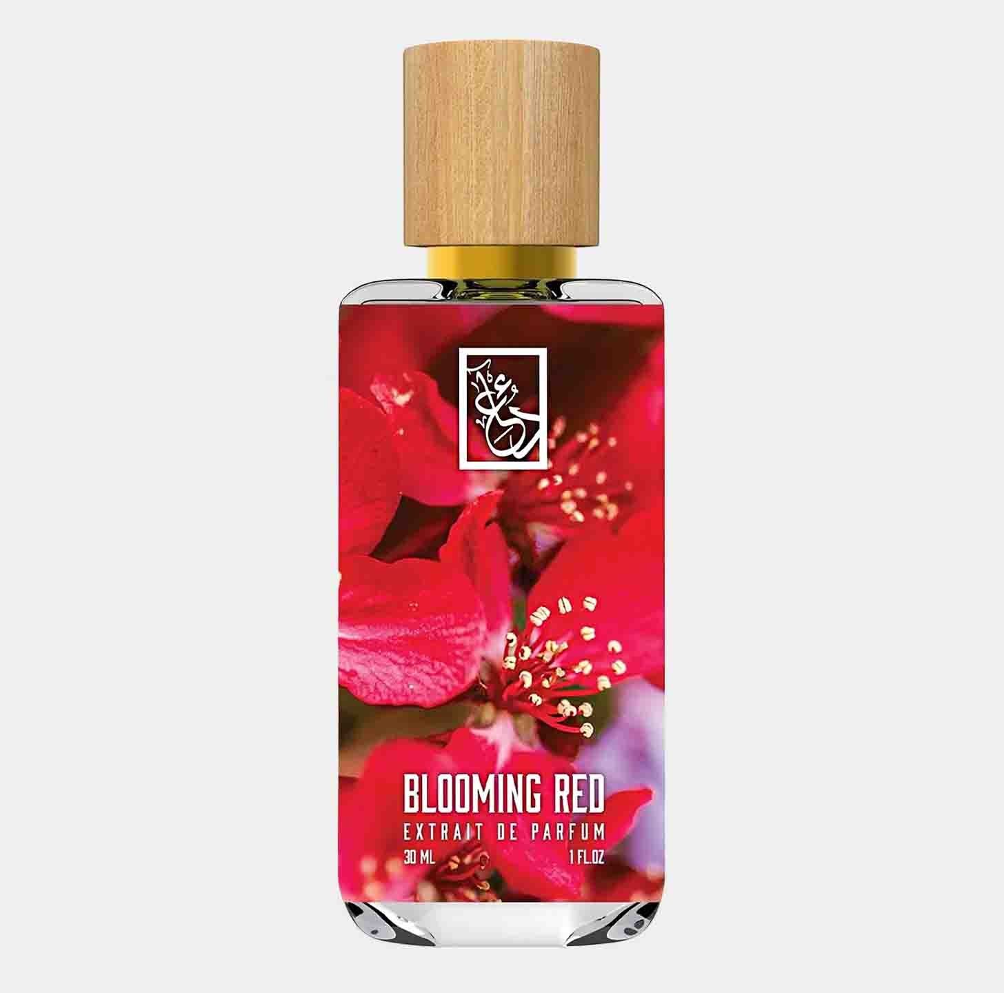 Dua Blooming Red Sample is a 30 ml bottle of extrait de parfum, featuring a vibrant floral design with red blooms and a natural wood cap, perfect for an elegant fragrance experience.