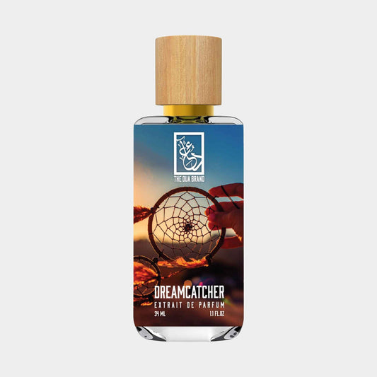 Dua Dreamcatcher Sample, a 30ml perfume bottle featuring a wooden cap and a label depicting a dreamcatcher against a sunset background.
