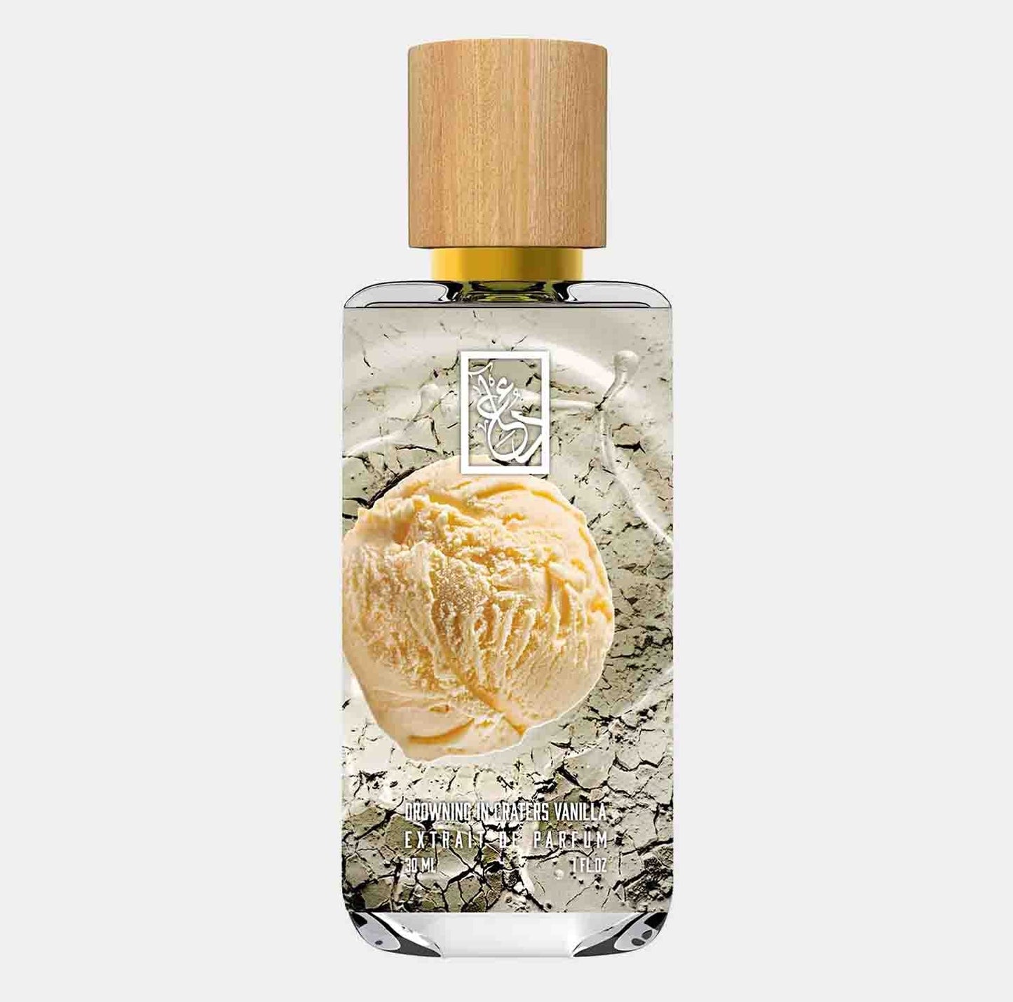 A bottle of Dua Drowning in Craters Vanilla Sample, featuring a wooden cap and an image of creamy vanilla ice cream set against a cracked earth background. The fragrance is presented in a clear glass bottle, showcasing its elegant design.