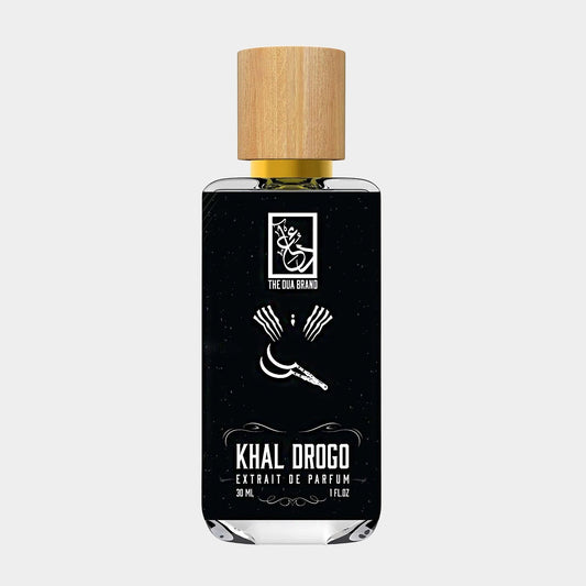 A sleek black bottle of Dua Khal Drogo Sample perfume with a wooden cap, featuring distinctive graphics and labeled as Extrait de Parfum in bold lettering. The bottle holds 30 ml of fragrance.