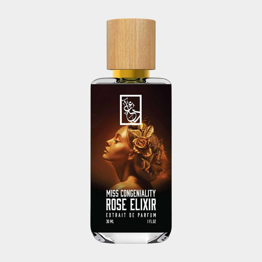 Dua Miss Congeniality Rose Elixir Sample is a 30 ml fragrance bottle featuring an elegant design with a wooden cap. The label displays a striking image of a woman adorned with flowers, emphasizing the perfume's floral notes.