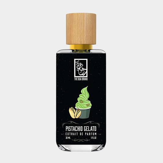 A 30ml bottle of Dua Pistachio Gelato Sample, featuring a black label with an illustration of a gelato cone topped with green pistachio gelato and garnished with pistachio nuts, capped with a wooden lid.