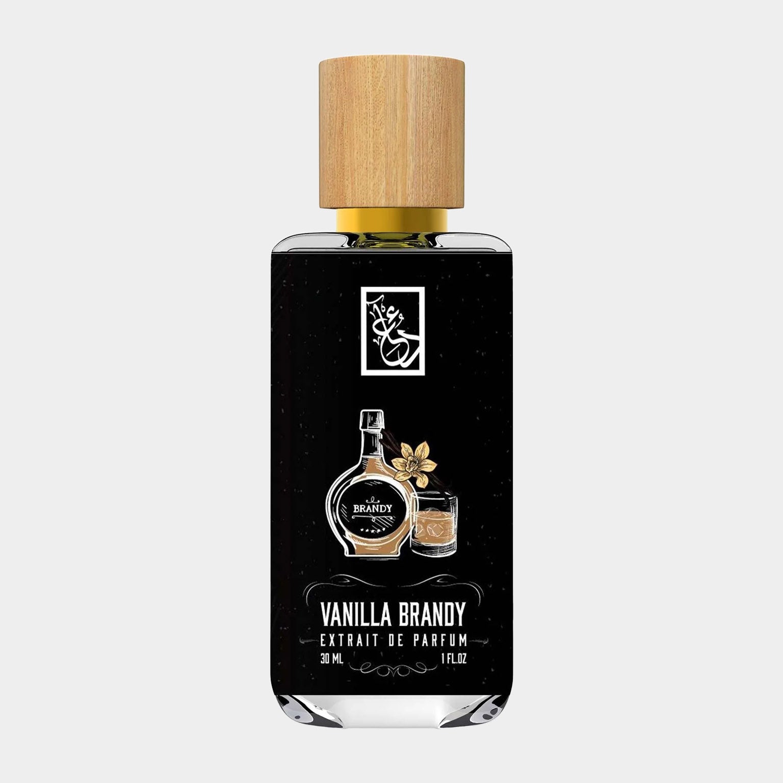 Dua Vanilla Brandy Sample bottle, featuring a sleek design with a wooden cap, contains 30 ml of an extrait de parfum that blends rich vanilla and brandy notes. The elegant label showcases the product name prominently.