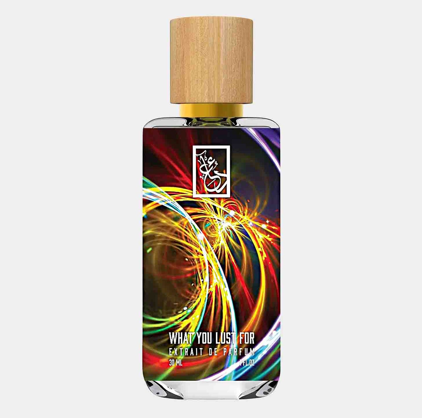 Dua What You Lust For Sample is a stylish 30ml bottle of extrait de parfum, featuring a vibrant, colorful design and a wooden cap.