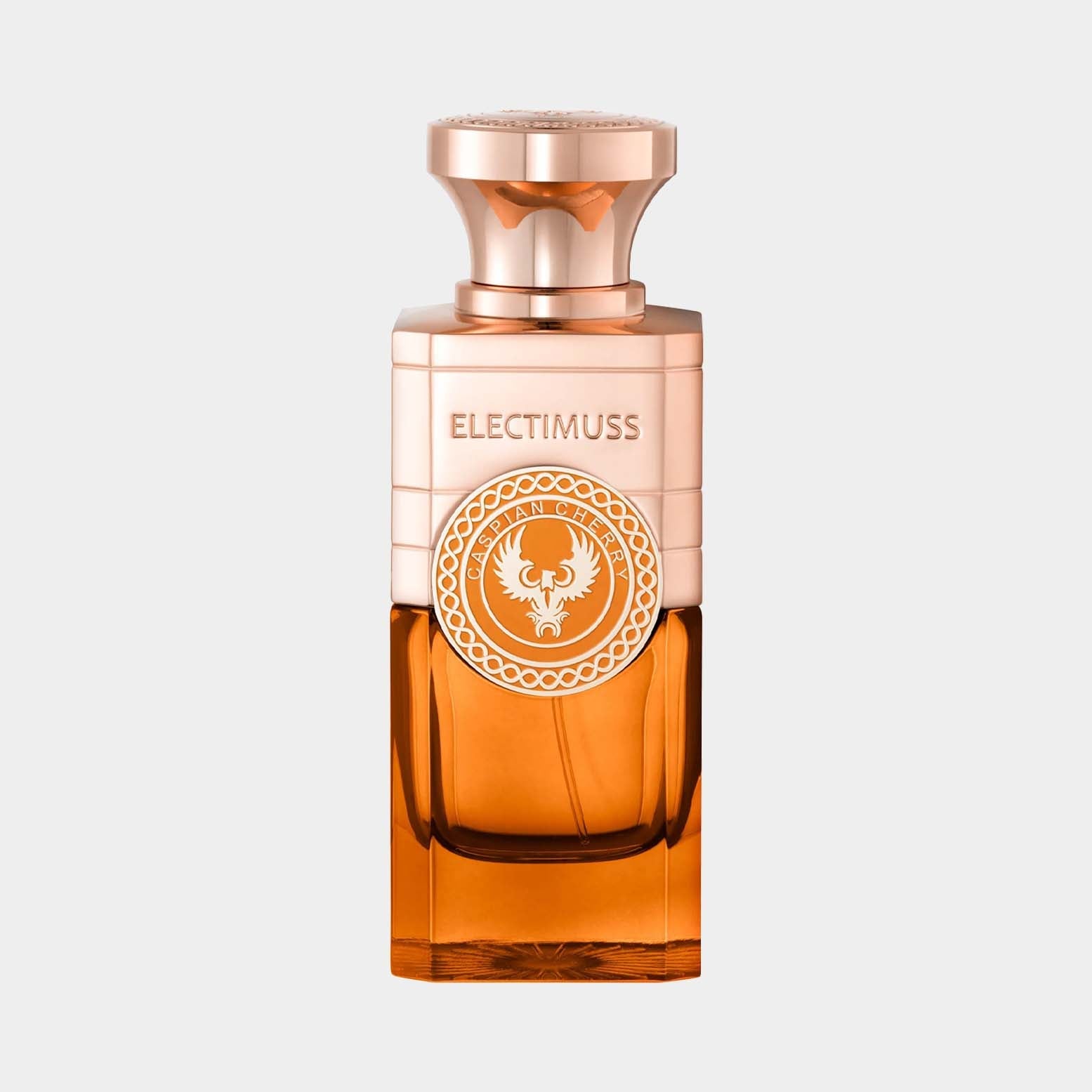 Electimuss Caspian Cherry Sample bottle, featuring a sleek design with a rose gold cap and an ornate logo, showcasing a rich amber liquid inside.