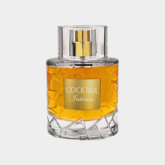 A clear glass bottle of Fragrance World Cocktail Intense Sample, featuring a gold label and an angular design, showcasing a rich amber liquid inside.