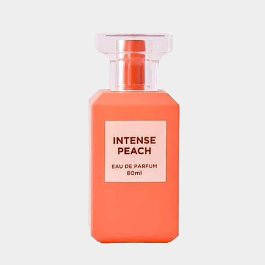 A peach-colored bottle of Fragrance World Intense Peach Sample, featuring a minimalist label and a clear cap, containing 80ml of eau de parfum.