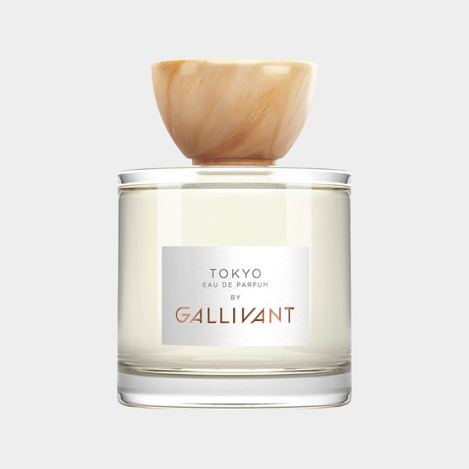 A clear glass bottle of Gallivant Tokyo Sample, featuring a minimalist design with a light-colored cap and a label that reads Tokyo Eau de Parfum by Gallivant.