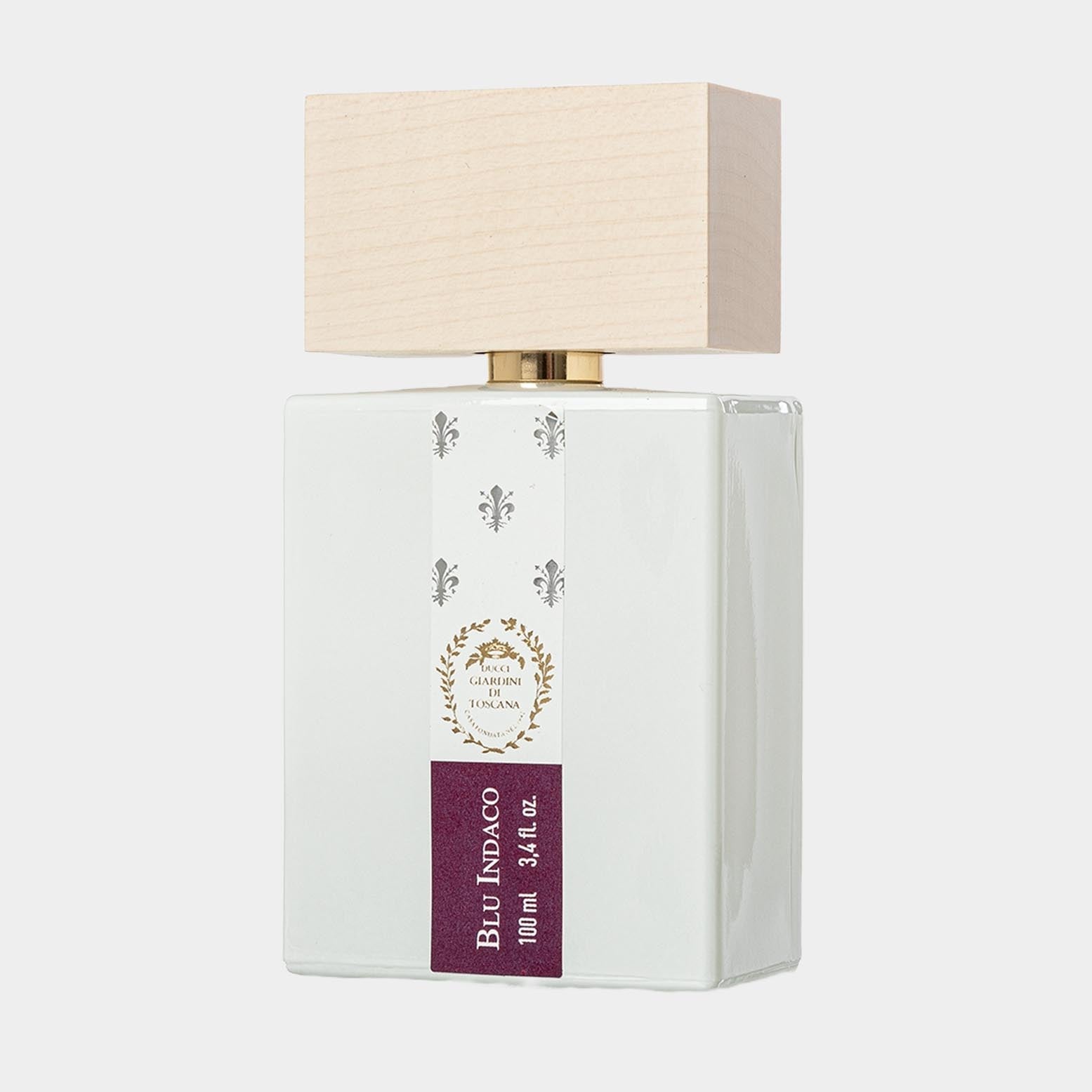 A stylish bottle of Giardini di Toscana Blu Indaco Sample, featuring a square design with a white finish and a light wooden cap, containing 100 ml of fragrance.