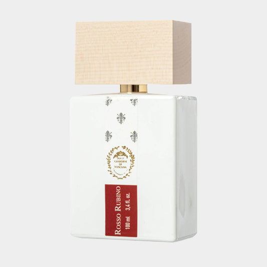 A sleek white perfume bottle featuring a wooden cap, labeled Giardini di Toscana Rosso Rubino Sample, with a logo and decorative details on the front.