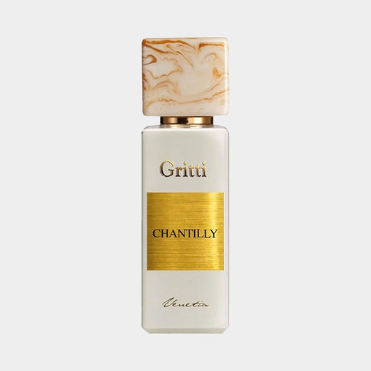 Full bottle of Gritti Chantilly EDP featuring a sleek white container with a gold label and an elegant marbled cap.