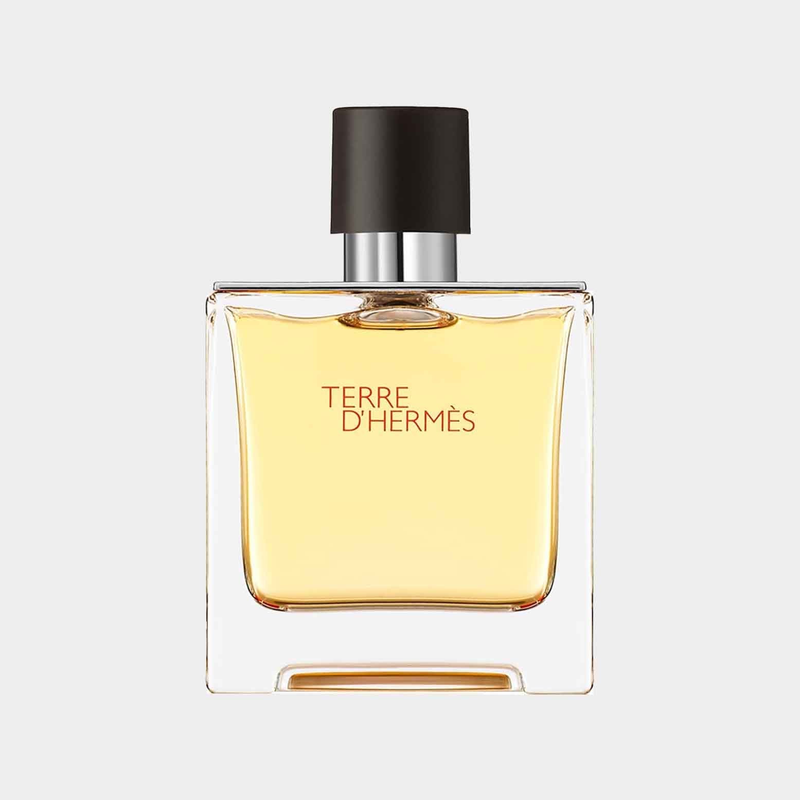 Hermès Terre d’Hermes Pure Perfume Sample in a rectangular glass bottle with a black cap, showcasing a warm, golden fragrance.