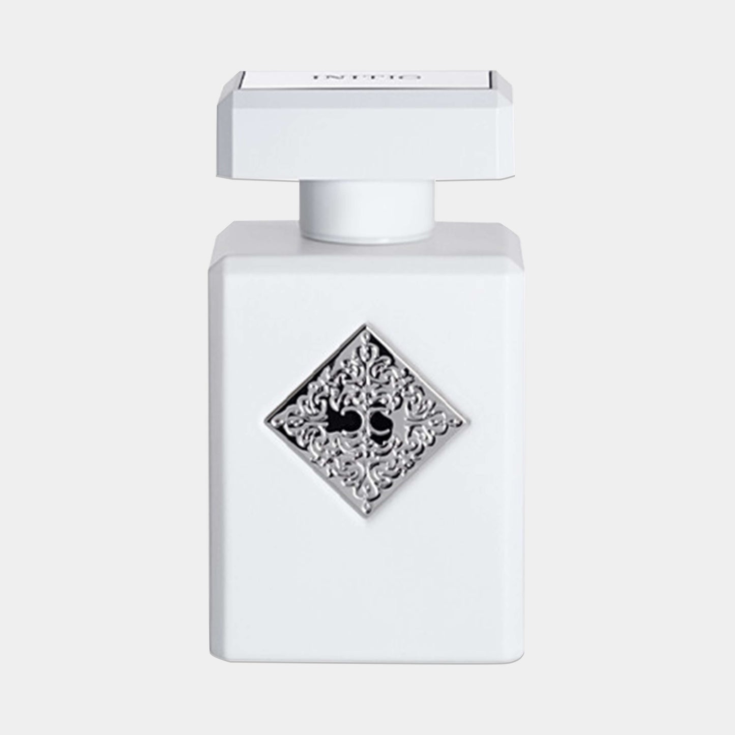 Initio Rehab Sample fragrance bottle, featuring a white design with an ornate silver diamond emblem and skull motif, showcasing a luxurious and elegant presentation.