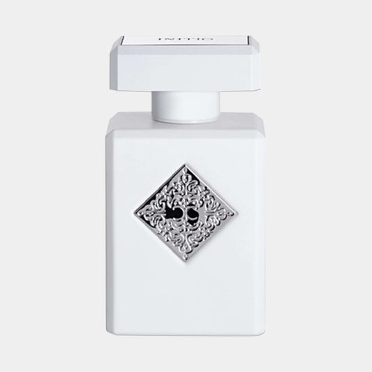 Initio Rehab Sample fragrance bottle, featuring a white design with an ornate silver diamond emblem and skull motif, showcasing a luxurious and elegant presentation.
