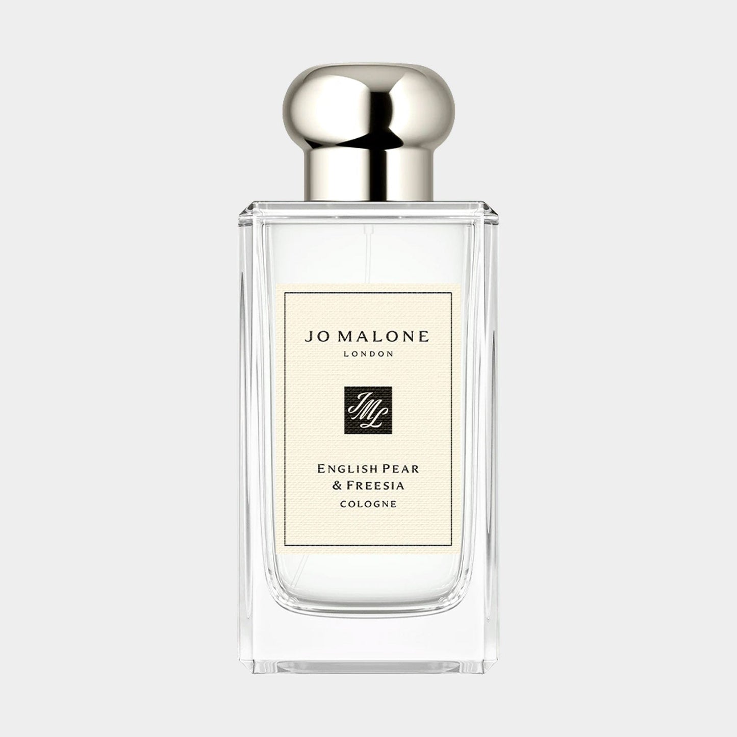A clear glass bottle of Jo Malone London English Pear & Freesia sample cologne, featuring a sleek design and a silver cap, elegantly labeled to highlight its floral and fruity scent.