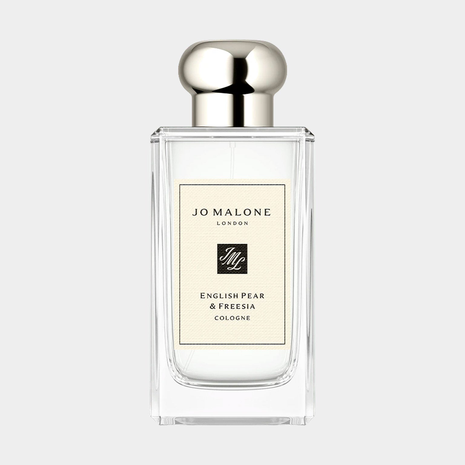 A clear glass bottle of Jo Malone London English Pear & Freesia sample cologne, featuring a sleek design and a silver cap, elegantly labeled to highlight its floral and fruity scent.